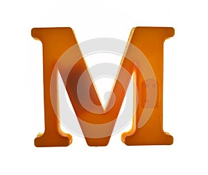 Plastic letter M on magnet isolated on white background