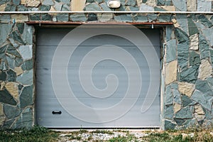 Plastic lift gate of garage in residential house