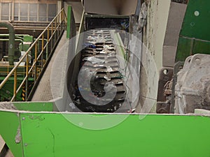 Plastic line in waste treatment factory photo