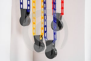 Plastic manual height adjusters for wall backdrop support system with cross bars and rolls colorful paper backgrounds photo studio photo