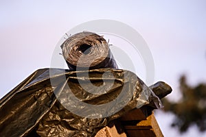 Plastic material on building site facade