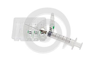 Plastic medical syringe with hypodermic needle and pharmaceutical products ampoules