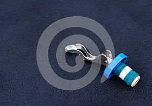 Plastic and metal wine bottle stopper