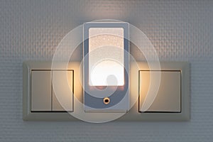 Plastic nightlight illuminating