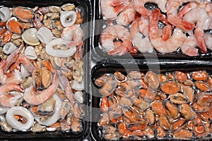 Plastic packages with seafood