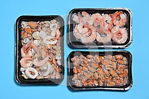 Plastic packages with seafood