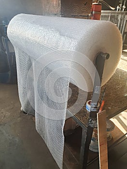 Plastic packaging with air bubbles, cellophane film to air, White Bubble Wrap Packing Or Air Cushion Film Abstract Horizontal