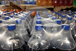 plastic packaging with plastic bottles with carbonated drink