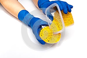 Plastic pellets . Colorant for polymers in granules. Hands in gloves takes plastic pellets