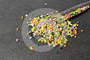 Plastic pellets. Dyes for plastic, polypropylene, polyethylene. Plastic granules on a stone background .Plastic pellets. Plastic
