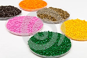 Plastic pellets .Polymeric dye ÃÂ² granules. The recycling of plastic. Granular colored plastic granules photo