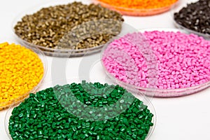Plastic pellets .Polymeric dye ÃÂÃÂ² granules. The recycling of plastic photo