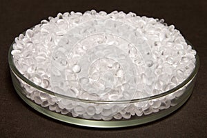 Plastic pellets. Transparent Polyethylene granules. Plastic Raw photo