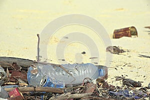 A plastic PET bottle washed on a beach