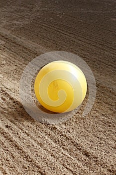 Plastic physioball on the sand during training for beginner riders and horses at riding school indoors