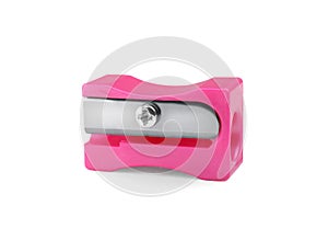 Plastic pink pencil sharpener isolated on white