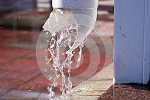 Plastic pipe on the water burst