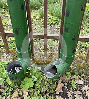 Plastic pipes as animal drinker for cats and dogs photo