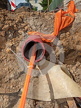 Plastic pipes containing electric cables in the ground