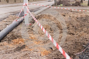 Plastic pipes in the ground during construction on the street