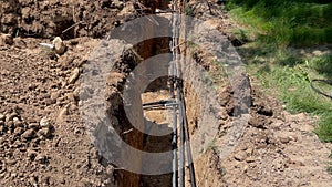 Plastic pipes laid in trenches. Move camera