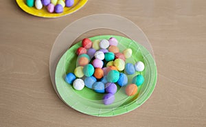 Plastic plate full of colorful playdough balls