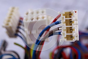 Plastic plugs mounted on electric cables. Electrical connectors for connecting devices and components.