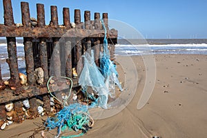 Plastic pollution. Environmental beach waste washed up from the