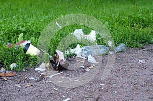 Plastic pollution in the park, close up.