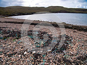 Plastic pollution - waste washed up on Muckle Roe, Shetland, UK