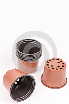 Plastic pots isolated on white background