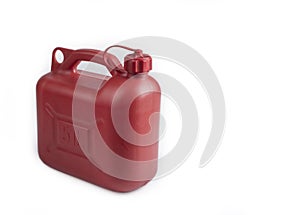 Plastic red 5 liter gas canister on a white