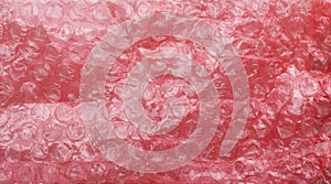 Plastic red bubble wrap texture background
