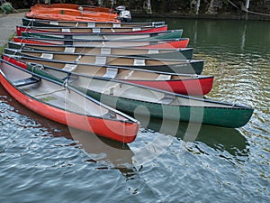 Plastic, red and green kayaks