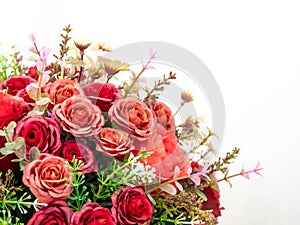 Plastic roses in artificial flower bouquet
