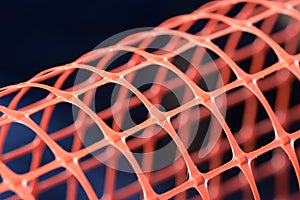 Plastic safety net for construction site. Construction mesh.