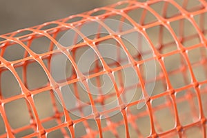 Plastic safety net for construction site. Construction mesh.