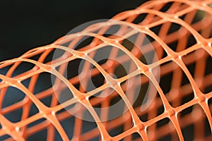 Plastic safety net for construction site. Construction mesh.