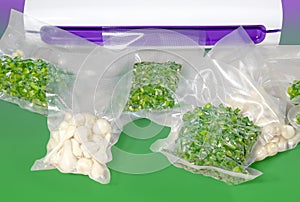 Plastic Sealing Machine. Vacuum packing of fresh greenery. Long-term storage of products. Horizontal