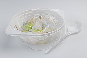 Plastic soup bowl and spoon with plastic soup