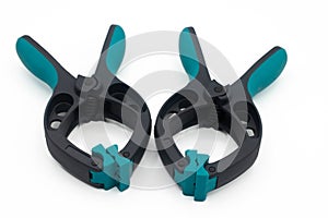 Plastic spring clamps on a white background