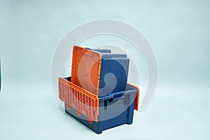 Plastic storage boxes. Boxes for the delivery of products. Orderly storage.
