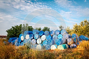 Plastic storage of drums, big blue barrels stacked up