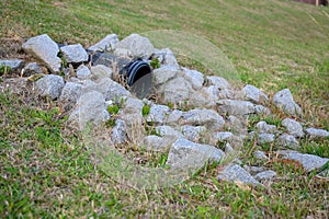 Plastic storm water outlet with rip-rap