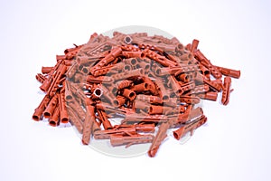 Plastic straddling dowel red white background