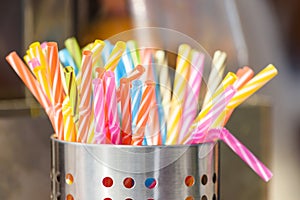 Plastic Straws In Metal Can photo