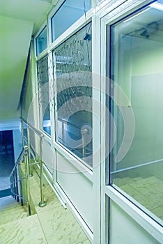 Plastic structures in operation; interior glass walls and doors.