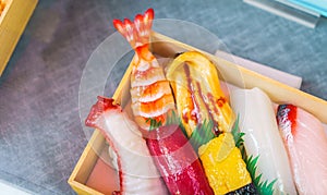 .Plastic Sushi rolls in a display case