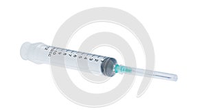 Plastic syringe isolated on a white background