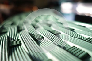 Plastic table with interlace pattern